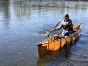 Canoeing with a dog in a Wenonah Encounter