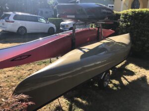 Malone MicroSport Trailer with canoe and two kayaks and cargo carrier