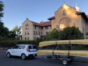 Malone MicroSport Kayak Canoe Trailer behind White Kia Soul Portland Oregon